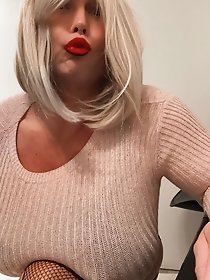 Transgender women in lingerie pose partially nude outdoors