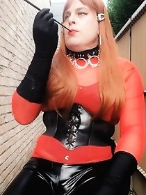 A transgender prostitute is posing without clothes outside