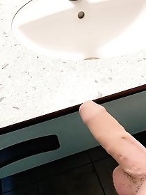 Crossdresser in translucent top and ample bosom