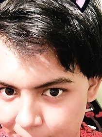 A beautiful shemale in pink stockings is having a good time