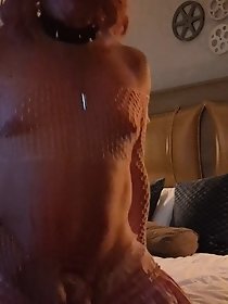 A nice girl in a sexy dress plays a little sissy